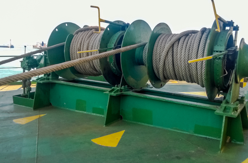 Mechanisms of tension control ropes. Winches. Equipment on the deck of a cargo ship or port.